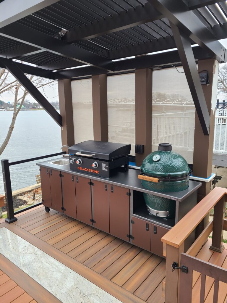Outdoor Kitchen With Blackstone Griddle and Big Green Egg